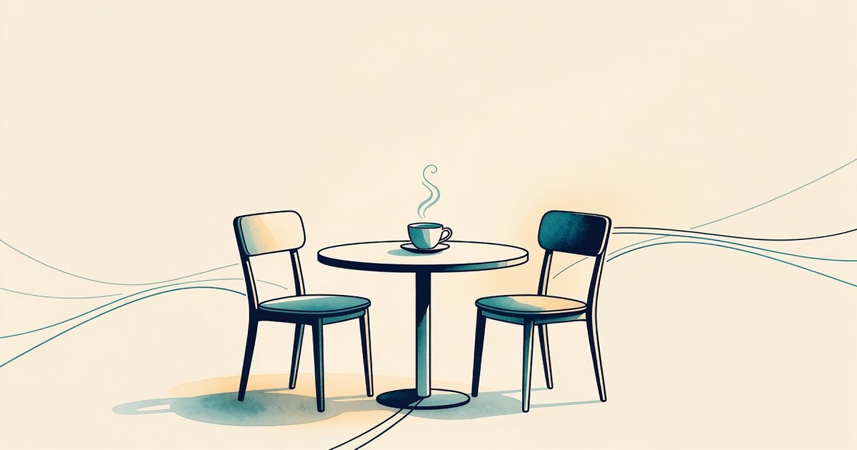 Dos sillas a una mesa, una taza, sin personas